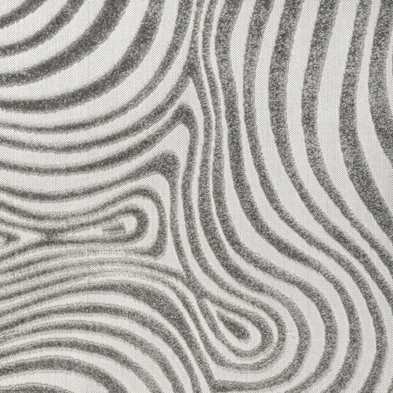 Gray and ivory square area rug close-up with concentric wavy swirl pattern