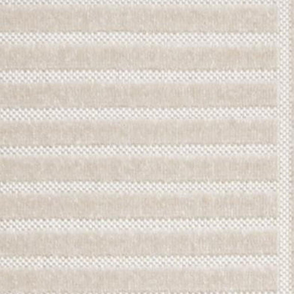 Ivory and cream striped indoor outdoor area rug, textured weave stripe detail close-up