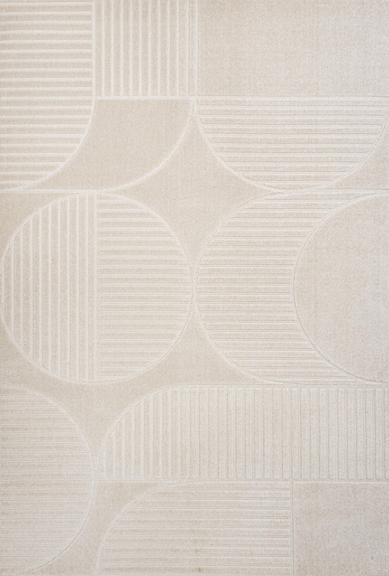 Ivory and cream area rug with raised geometric circles and stripe bands texture