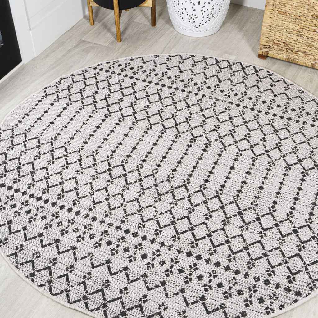 8' Cream And Black Round Trellis Indoor Outdoor Area Rug
