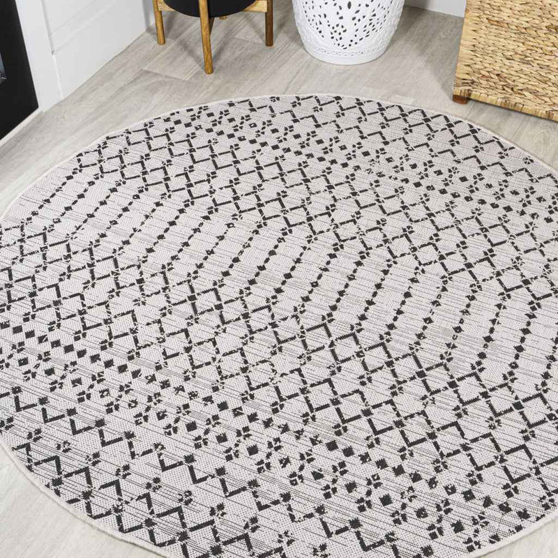 8' Cream And Black Round Trellis Indoor Outdoor Area Rug