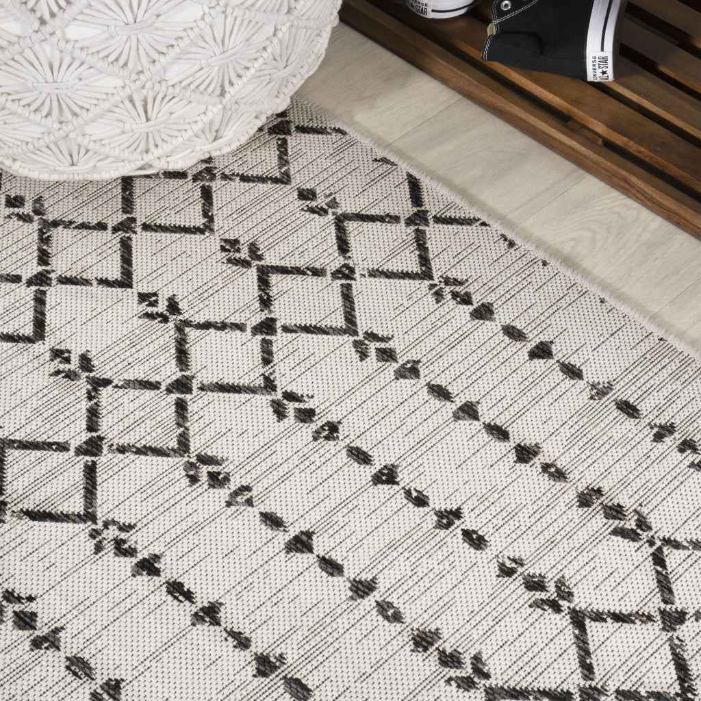 8' Cream And Black Round Trellis Indoor Outdoor Area Rug