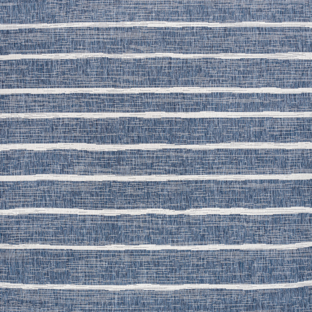 Blue and ivory striped indoor/outdoor area rug with textured horizontal bands