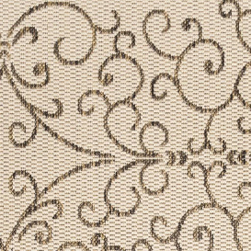 Beige indoor/outdoor area rug with brown square medallion pattern and scrolls.