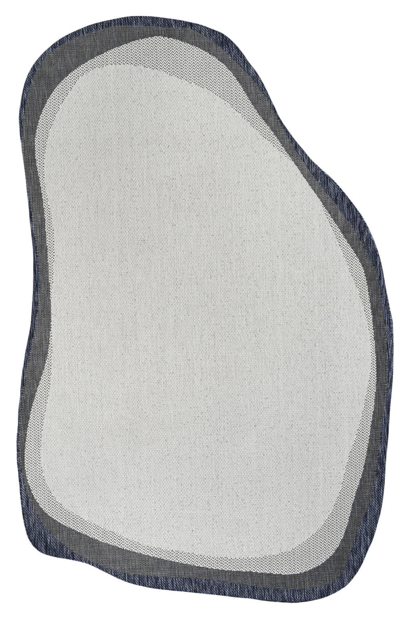 Cream abstract rug with rounded pebble shape and dark navy outer trim