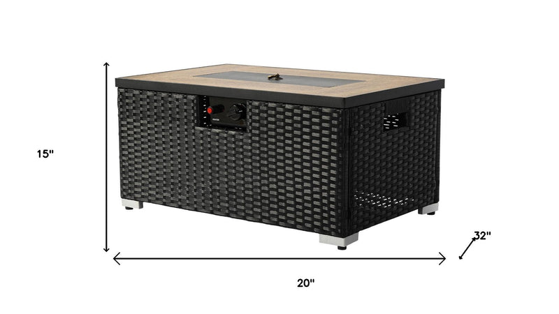 Rectangular propane fire pit with black wicker body and tan top; size 20" x 32" x 15"