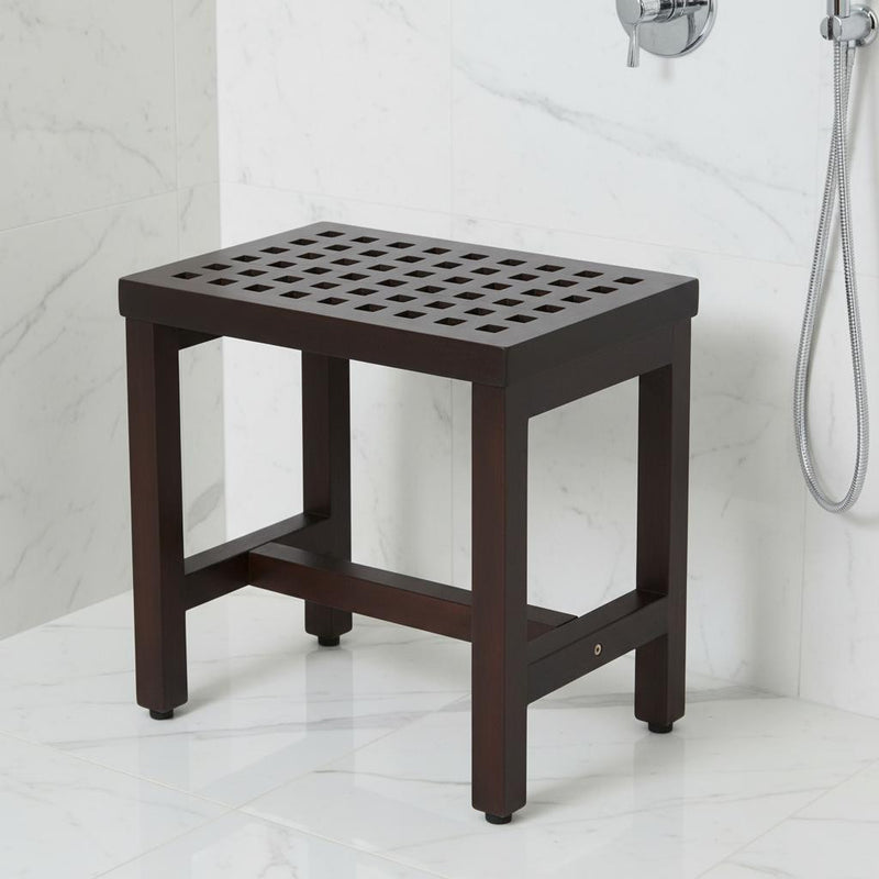 Brown teak shower bench with rectangular lattice seat and open lower frame