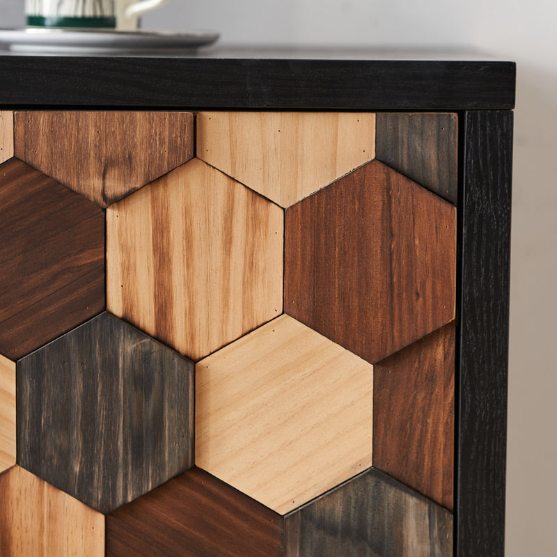 Geometric wood sideboard corner with hexagonal door panels and black trim