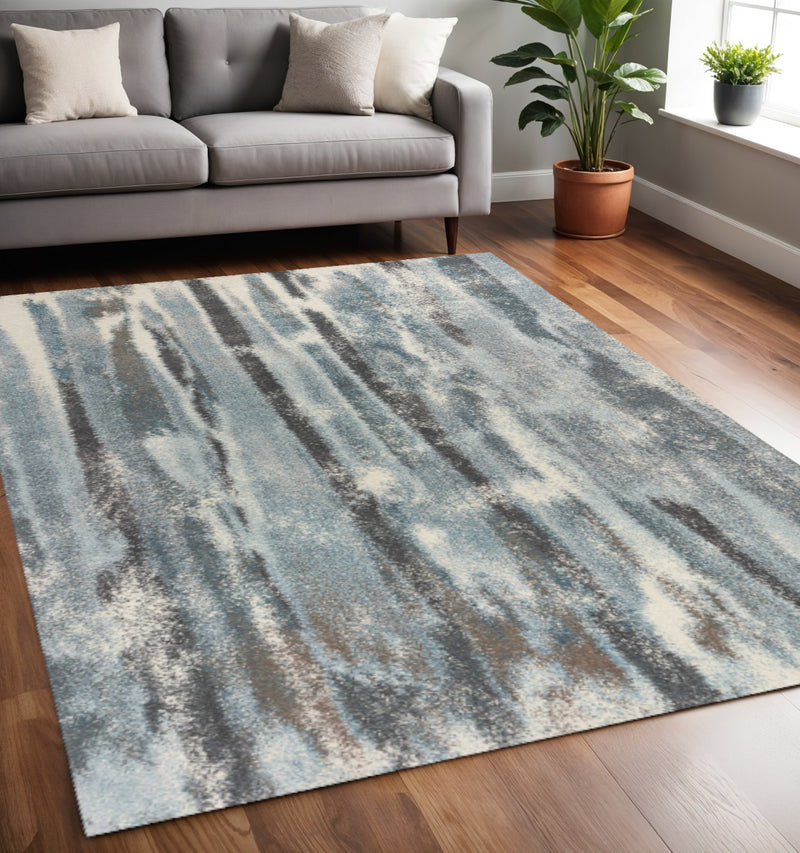 5' X 8' Teal Blue And White Abstract Area Rug - Home Decor