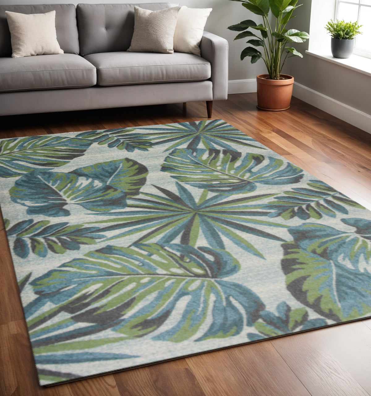 5' X 8' Beige Teal And Green Tropical Botanical Area Rug - Home Decor