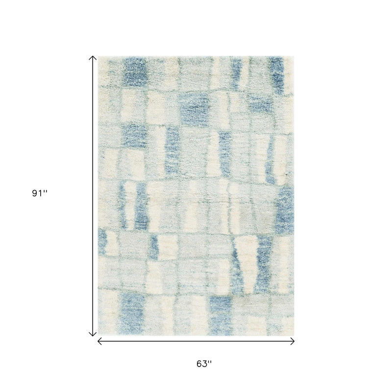 5' X 8' Ivory And Blue Abstract Area Rug - Home Decor