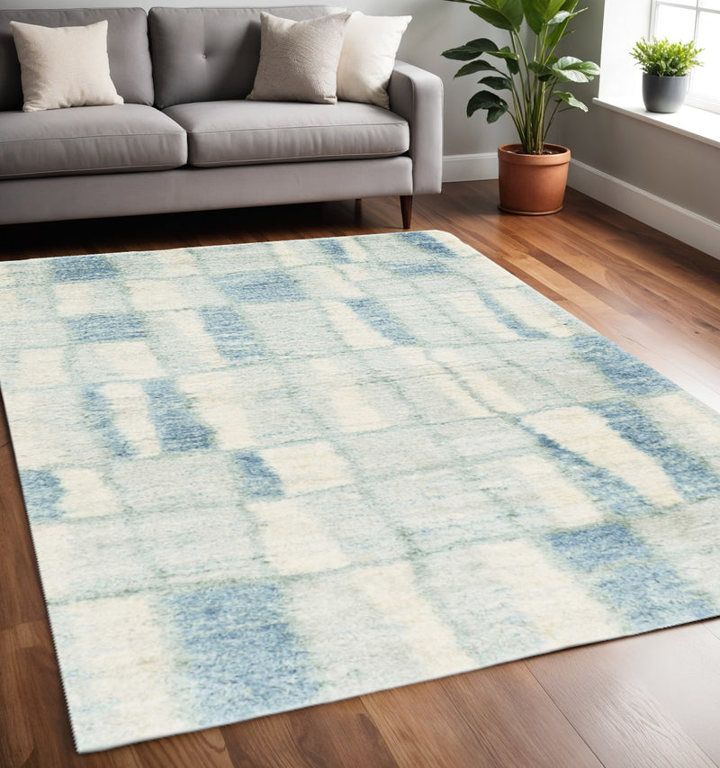 5' X 8' Ivory And Blue Abstract Area Rug - Home Decor