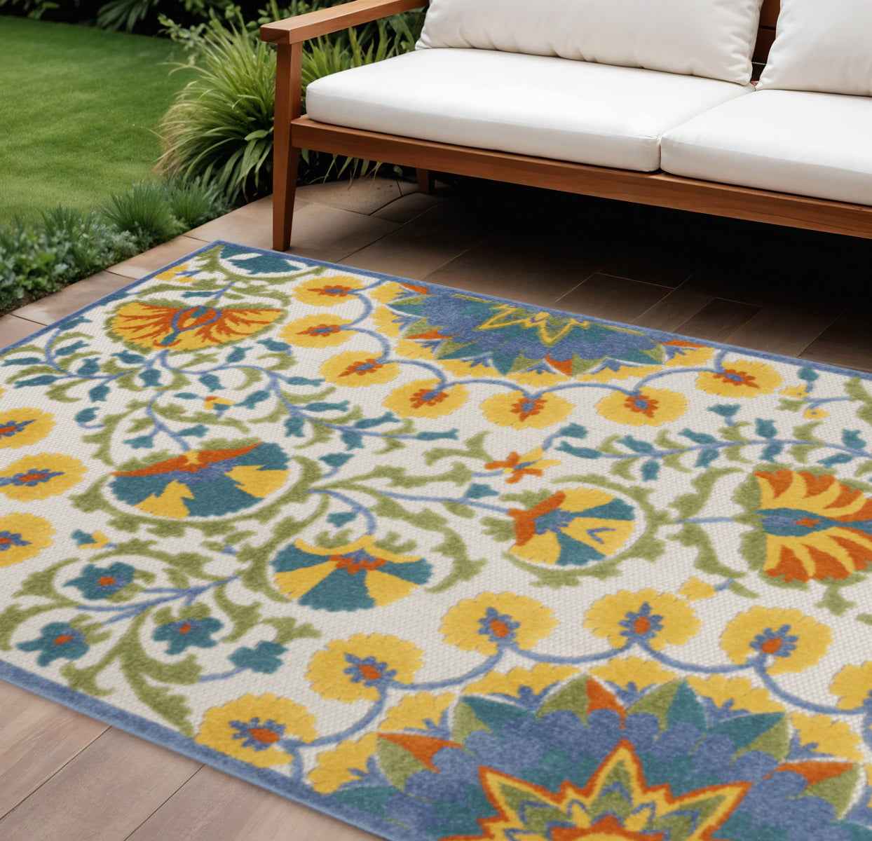 6' X 9' Ivory And Blue Floral Indoor Outdoor Area Rug