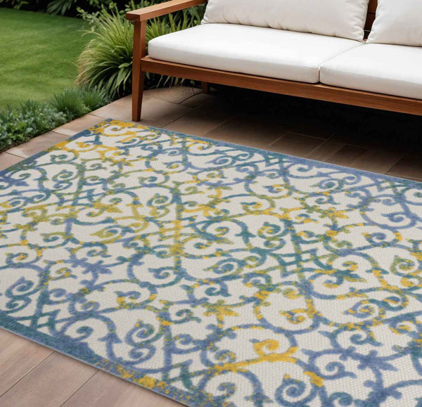6' X 9' Ivory And Blue Indoor Outdoor Area Rug