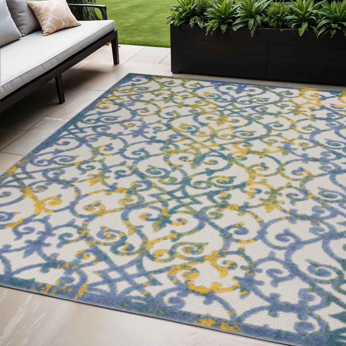 5' X 8' Ivory And Blue Indoor Outdoor Area Rug
