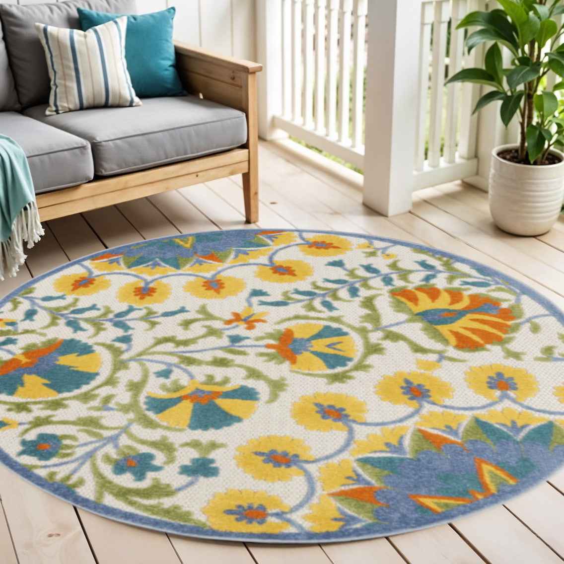 4' Ivory And Blue Round Floral Indoor Outdoor Area Rug