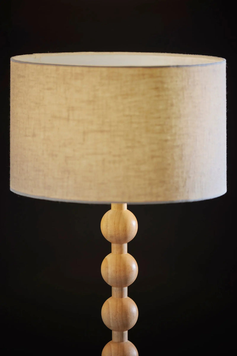 28" Brown Solid Wood Candlestick Table Lamp With Off White Drum Shade - GreatEagleInc
