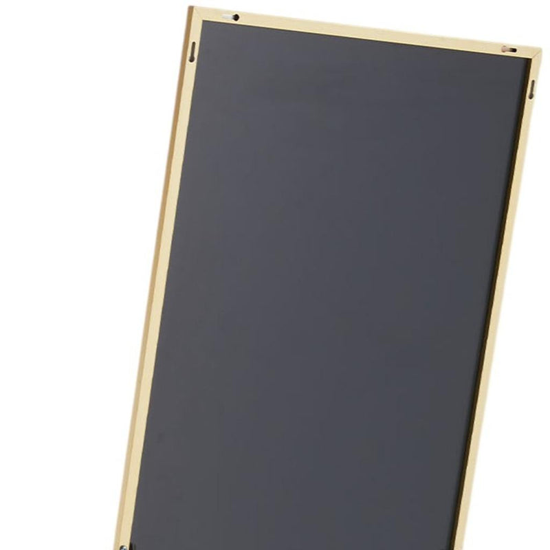 Gold metal-framed mirror with dark reflective back, corner and top mounting points