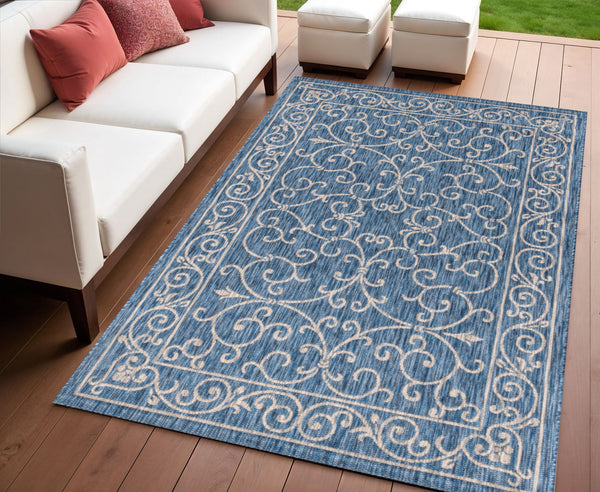 Navy blue area rug with gray medallion and ornate scroll border, indoor/outdoor, 4x6 ft