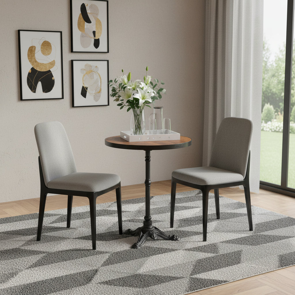 Round dining table with walnut-style round top and black pedestal base