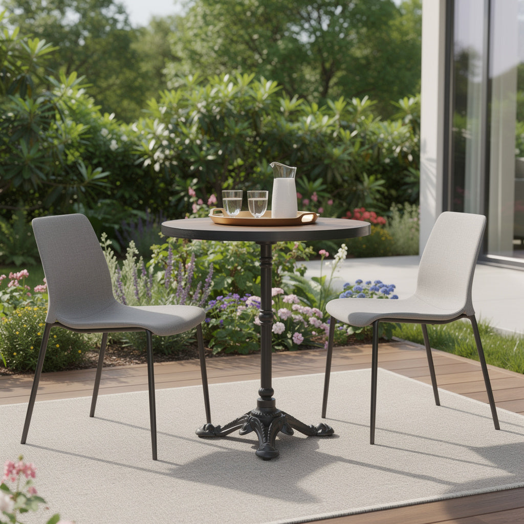 Outdoor dining table with walnut round top and black pedestal base