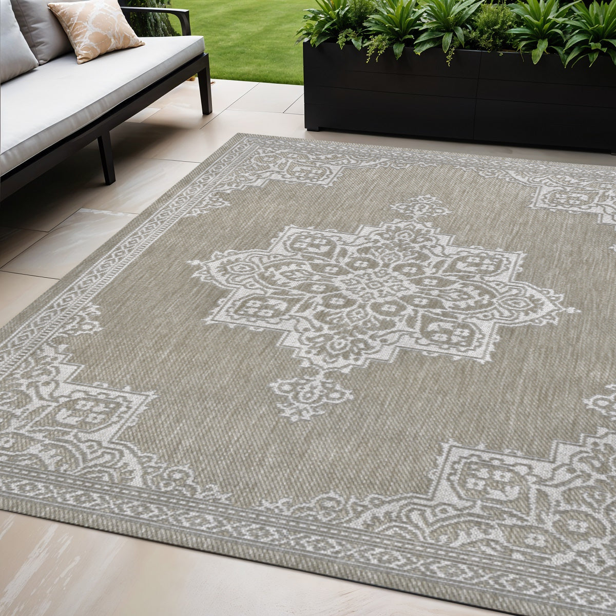 Beige and cream medallion indoor outdoor area rug with ornate border