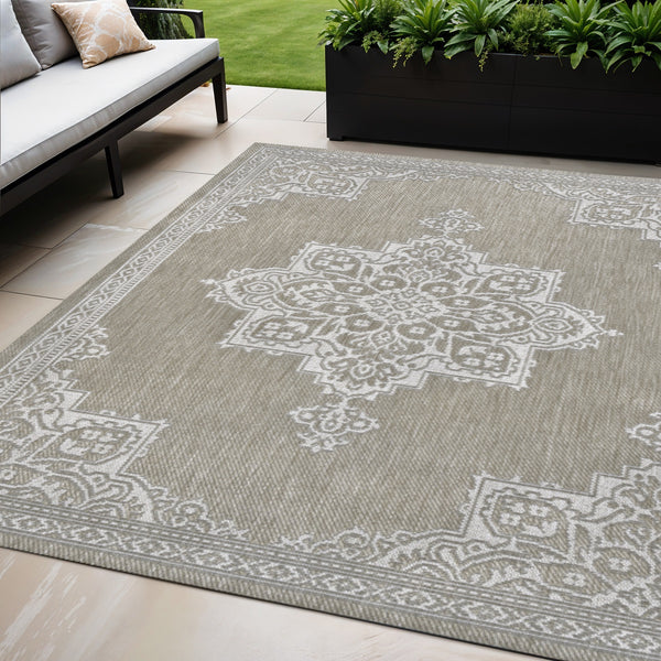 Beige and cream medallion indoor outdoor area rug with ornate border