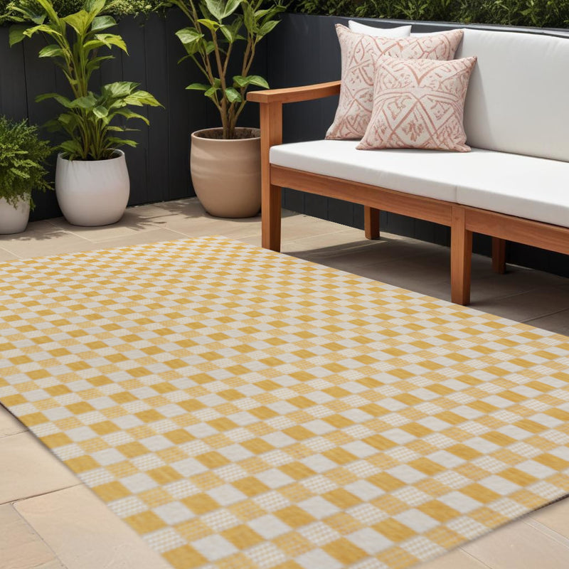 Yellow and cream geometric check area rug