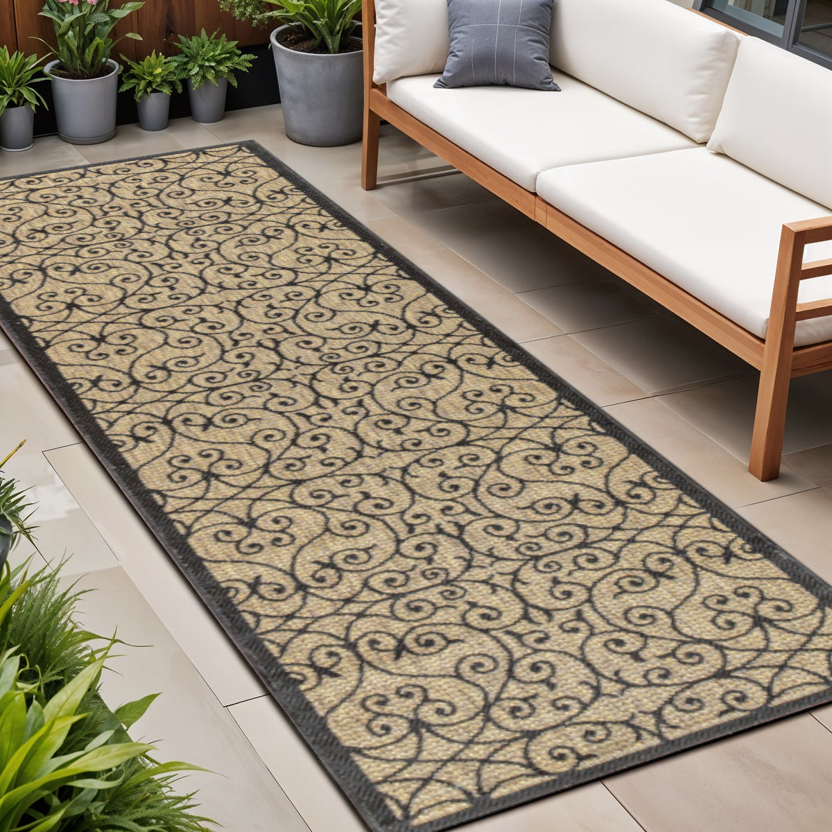 Indoor/outdoor runner rug with black and khaki scroll geometric pattern; trimmed edges