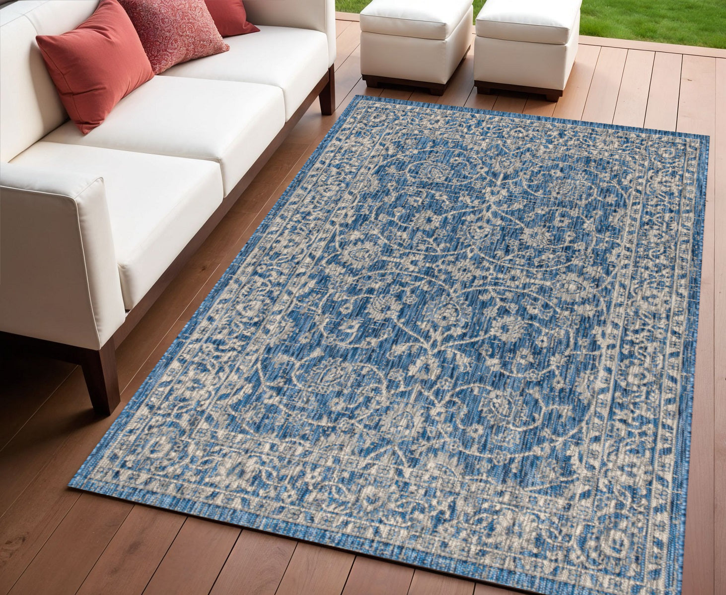 Blue medallion area rug with abstract pattern, rectangular indoor/outdoor placement