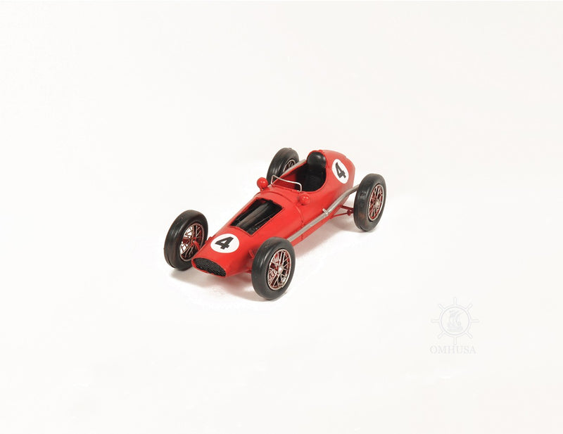 Red metal model car tabletop sculpture with number panel, top 3/4 view