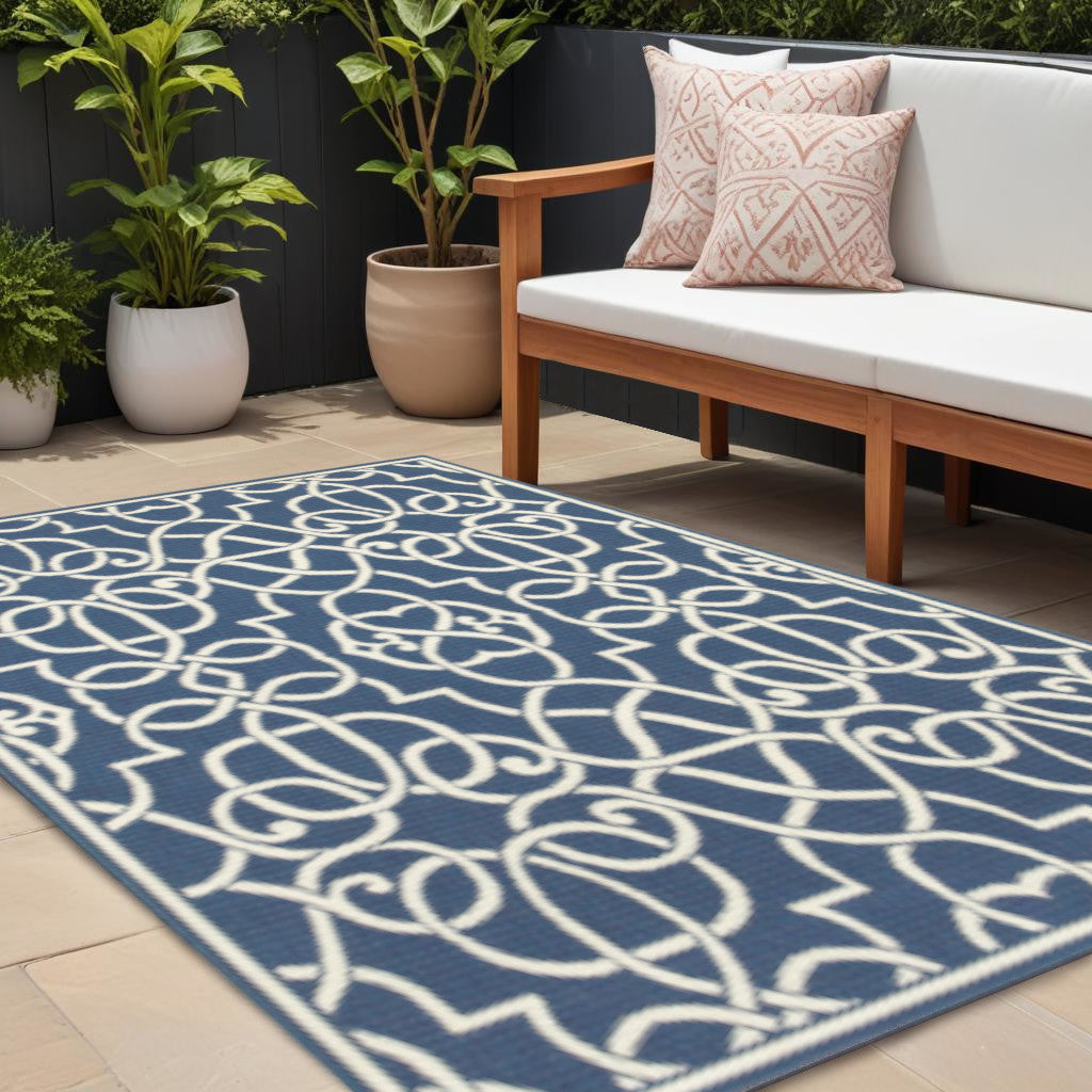 8' X 11' Blue and Ivory Geometric Stain Resistant Indoor Outdoor Area Rug - Outdoor