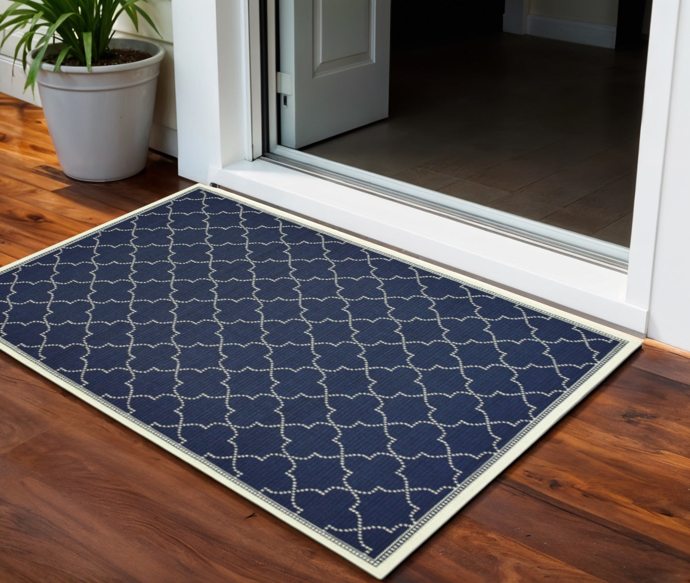 2' X 4' Blue and Ivory Geometric Stain Resistant Indoor Outdoor Area Rug - Outdoor