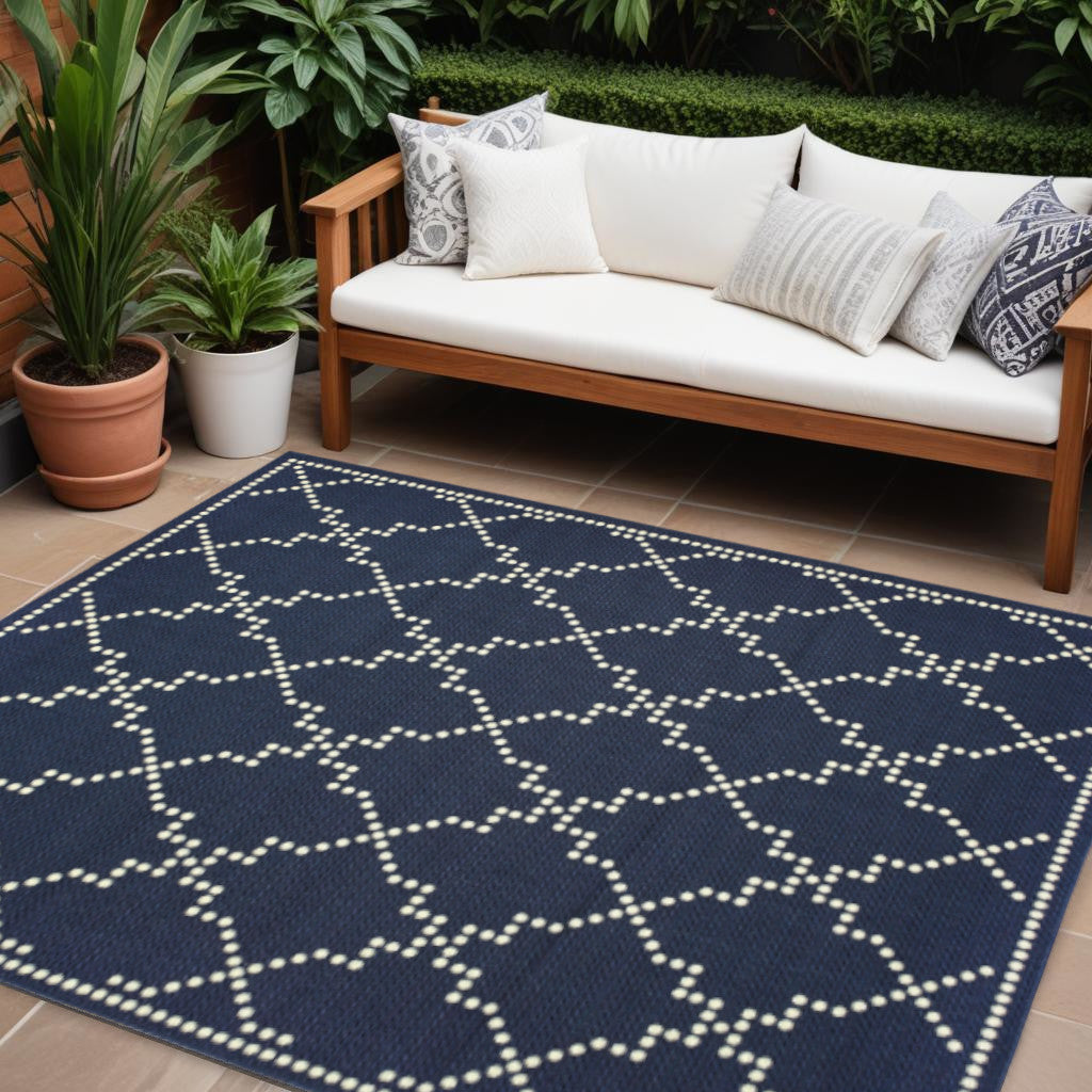 7' X 10' Blue and Ivory Geometric Stain Resistant Indoor Outdoor Area Rug - Outdoor
