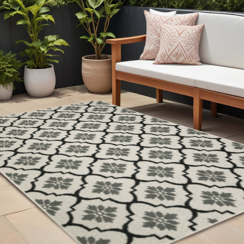 7' X 9' Beige and Black Geometric Stain Resistant Indoor Outdoor Area Rug - Sports & Outdoor