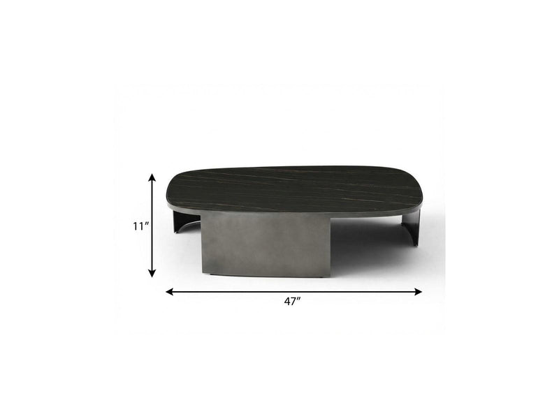 Coffee table with dark ceramic tile top and steel base, shown with 47 in by 11 in dimensions