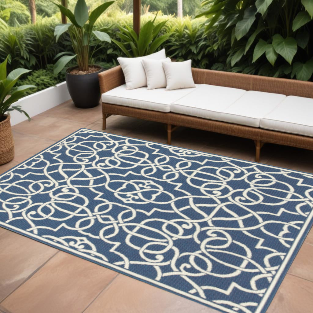 9' X 13' Blue and Ivory Geometric Stain Resistant Indoor Outdoor Area Rug - Outdoor