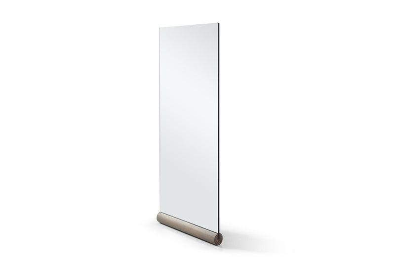 Leaning frameless accent mirror with dark brown bottom support, side profile view