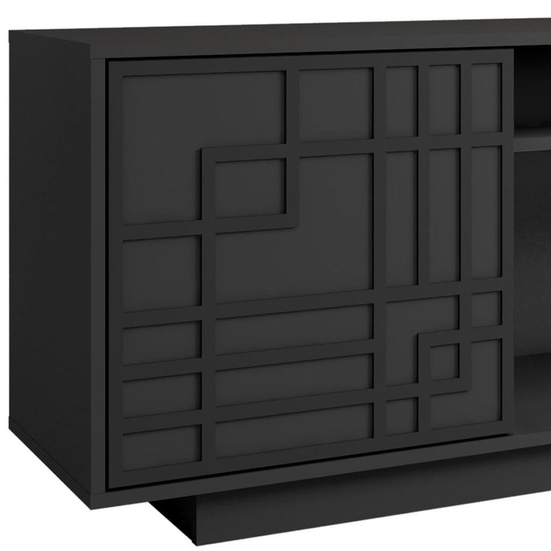 Carved geometric panel on black TV stand cabinet door