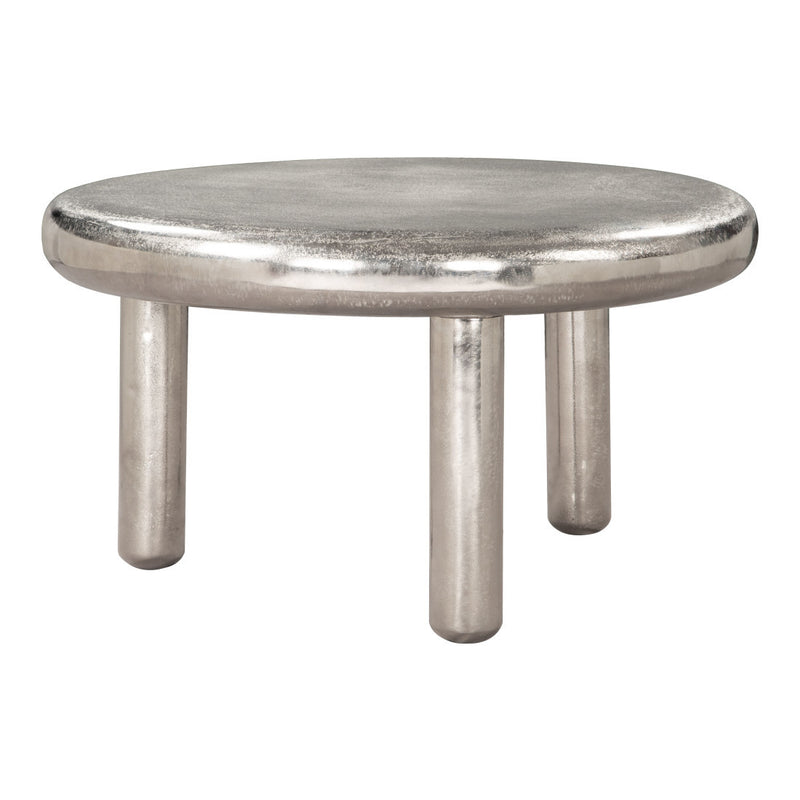 Silver round coffee table with reflective tabletop and four straight pedestal legs