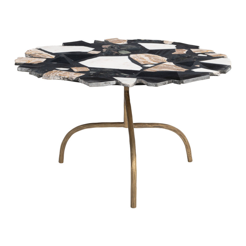 Terrazzo coffee table with irregular black, white, and gold tile top and bronze-toned pedestal