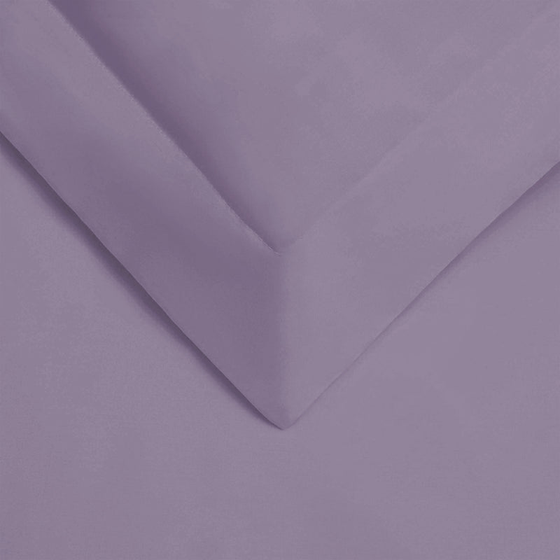 Lavender cotton duvet cover fabric close-up with stitched corner and fold