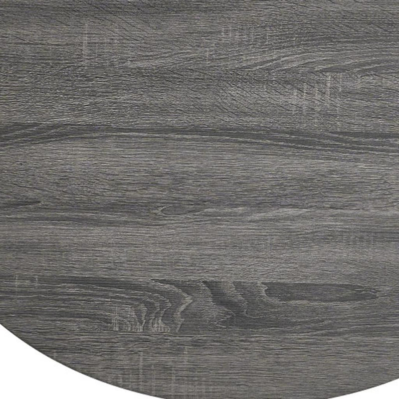 Close-up of the round tabletop with dark gray wood texture and subtle grain lines.