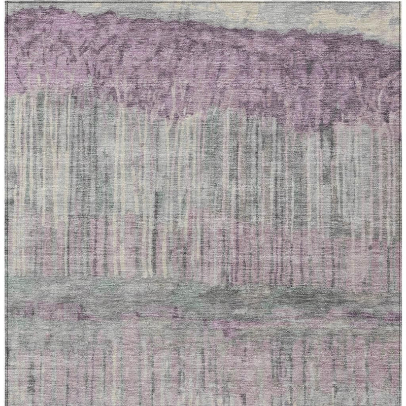 Lavender and plum abstract area rug with horizontal banding and distressed detailing.