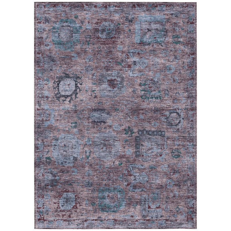 Rectangular area rug with abstract distressed shapes in blue and plum tones