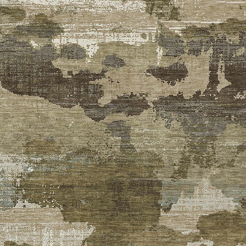 Khaki and beige abstract area rug close-up with distressed mottled blocks
