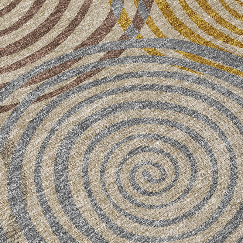 Geometric swirl area rug in gray, beige, blue, and mustard tones