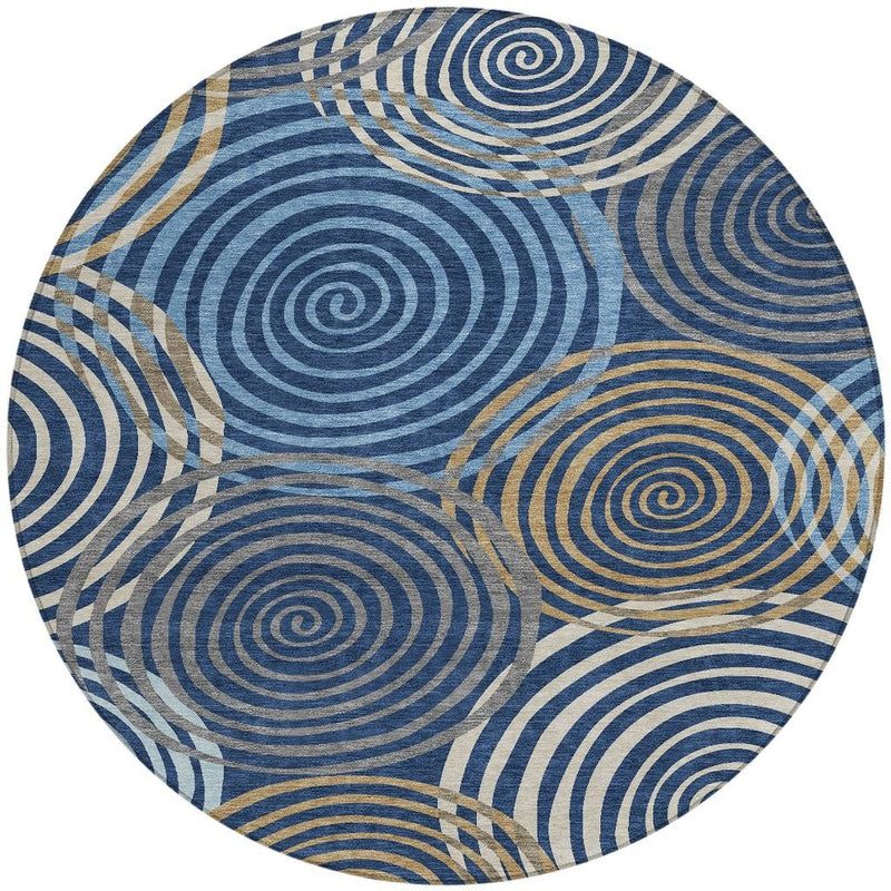 Round area rug featuring blue spiral circles with tan accents in a grid layout