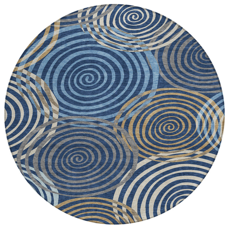 Round area rug showing repeating blue concentric spirals with tan dotted accents