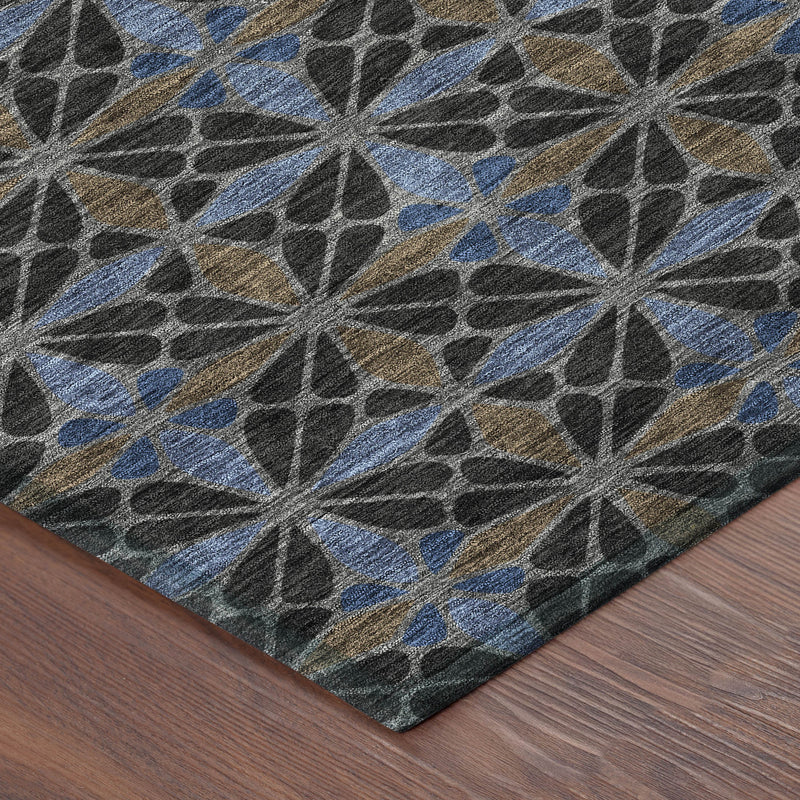 Geometric area rug with star pattern, dark gray and blue tones, and tan geometric highlights